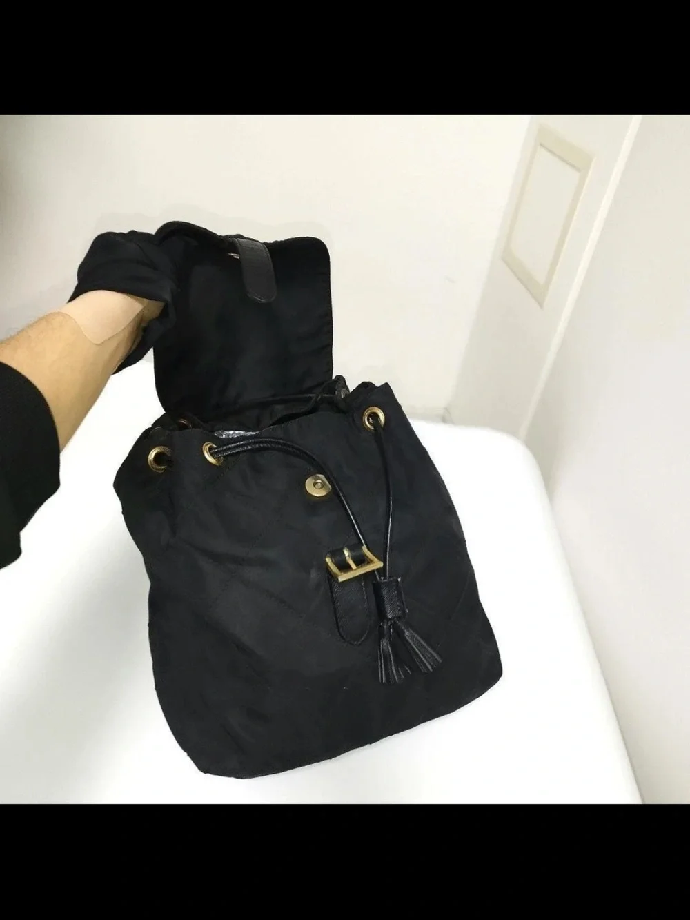 Prada Black Quilted Nylon Drawstring Backpack with Gold Hardware